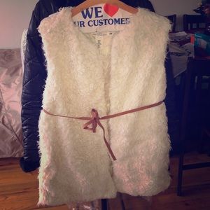 Off white shaggy / teddy vest w/brown belt